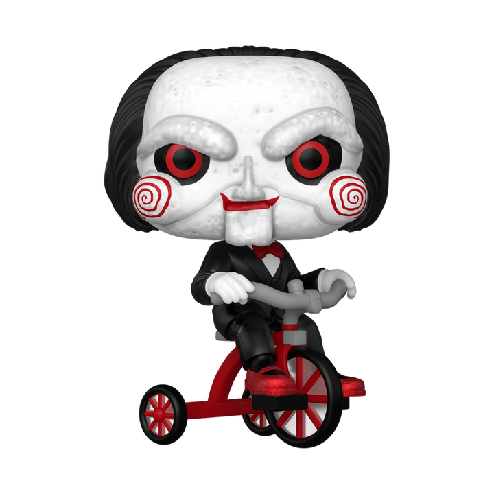 Funko Pop! vinyl figure of Billy the Puppet from Saw riding a red tricycle on a white background.