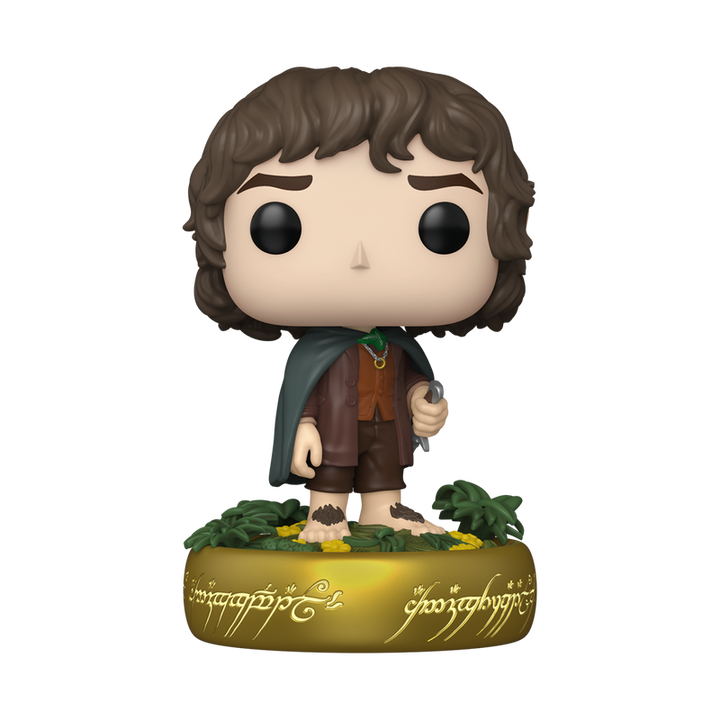 Funko Pop! vinyl figure of Frodo Baggins standing on glowing One Ring base with sword and green cloak on a white background.