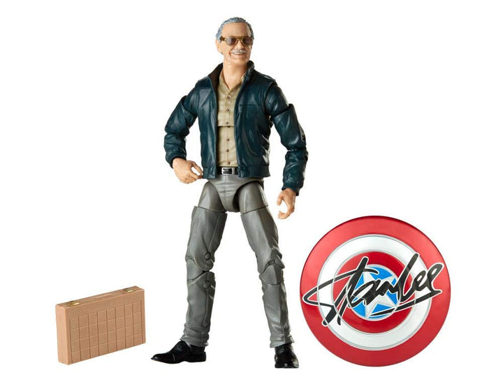 Action figure of a character in a blue jacket and gray pants with a shield logo on a white background