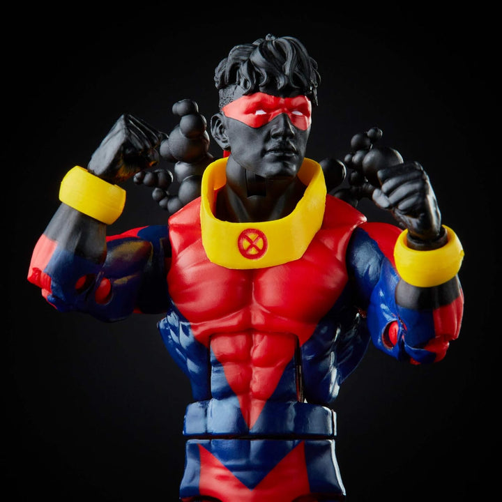 Superhero Sunspot action figure with red, blue, and yellow costume on a black background