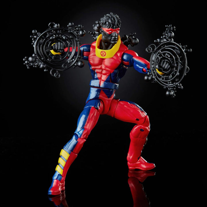 Superhero Sunspot action figure in red, blue, and yellow costume with black masks on a dark background