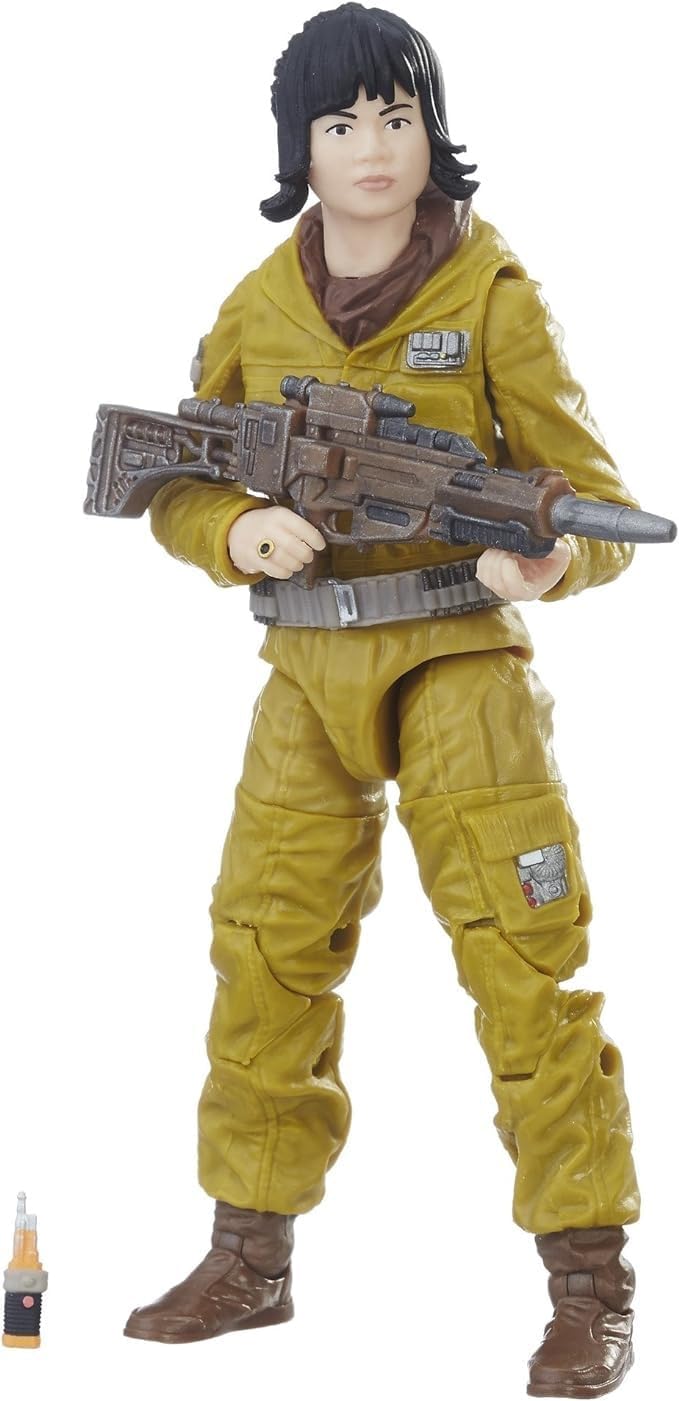 Action figure in yellow uniform holding a weapon on a white background