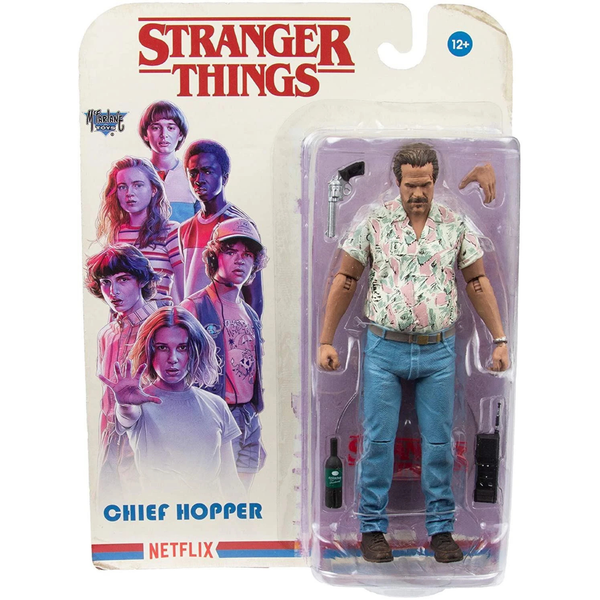 Action figure of Chief Hopper from 'Stranger Things' in packaging with character images on a white background.