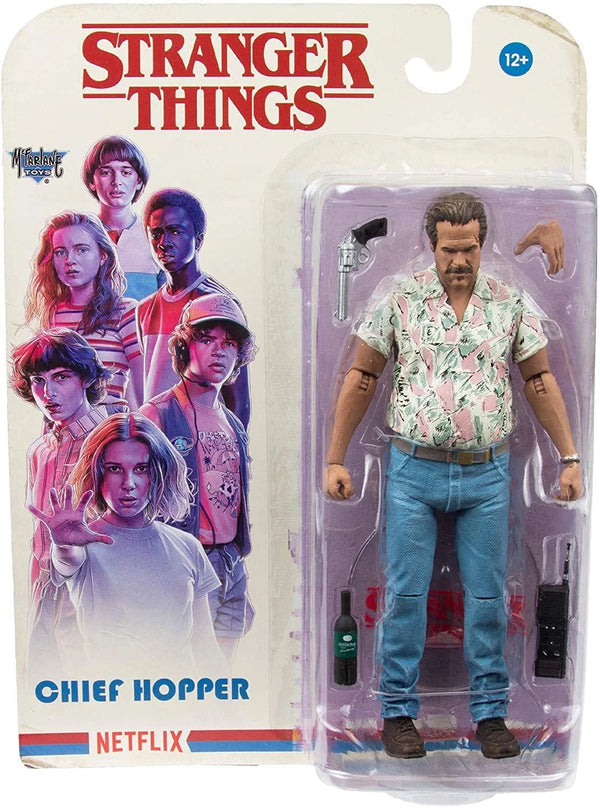Action figure of Chief Hopper from 'Stranger Things' in packaging with character images on a white background