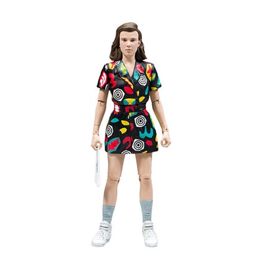 Action figure in a colorful dress with a white background