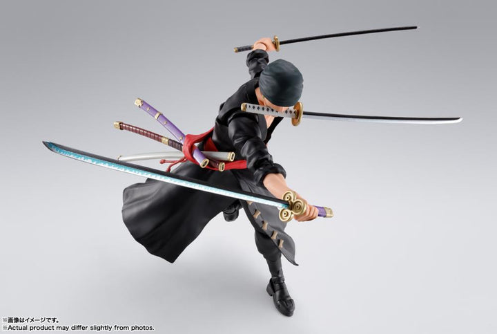 Zoro figure with fierce expression slashing with all three swords on a white background